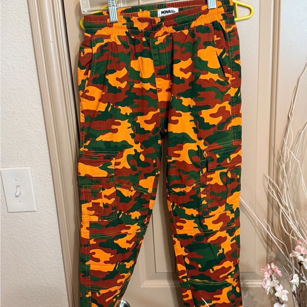 Fashion Nova Neon Orange and Green Camo Pants in Boys